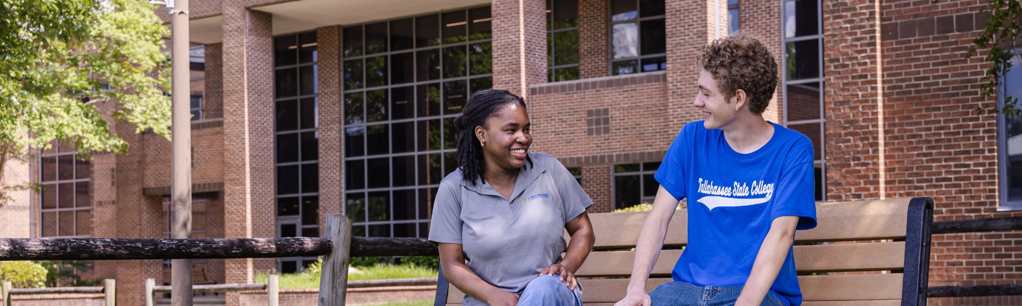 Students chatting outside the Student Union.